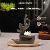 Thác khói trầm hương đốt nụ trầm không chỉ đơn thuần là một vật trang trí, mà còn là một phương tiện kết nối với tâm hồn và mang lại sự thư thái cho tâm trí.